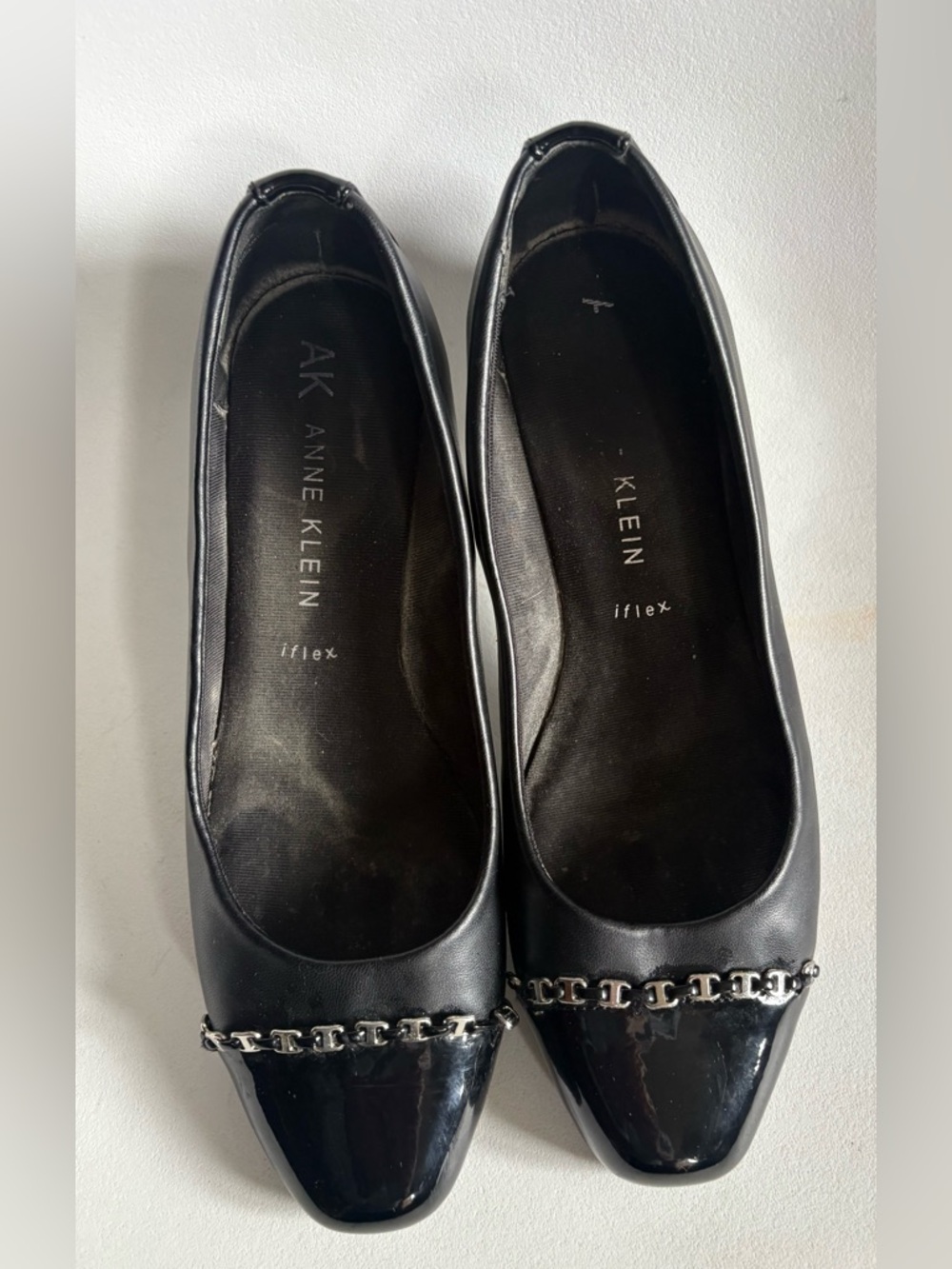 Anne Klein Black Leather Pointed-Toe Flats with Silver Chain Trim